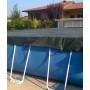 Couverture d’hivernage à tendeurs pour piscine de 5,3 x 10,25m de dimensions d'eau.